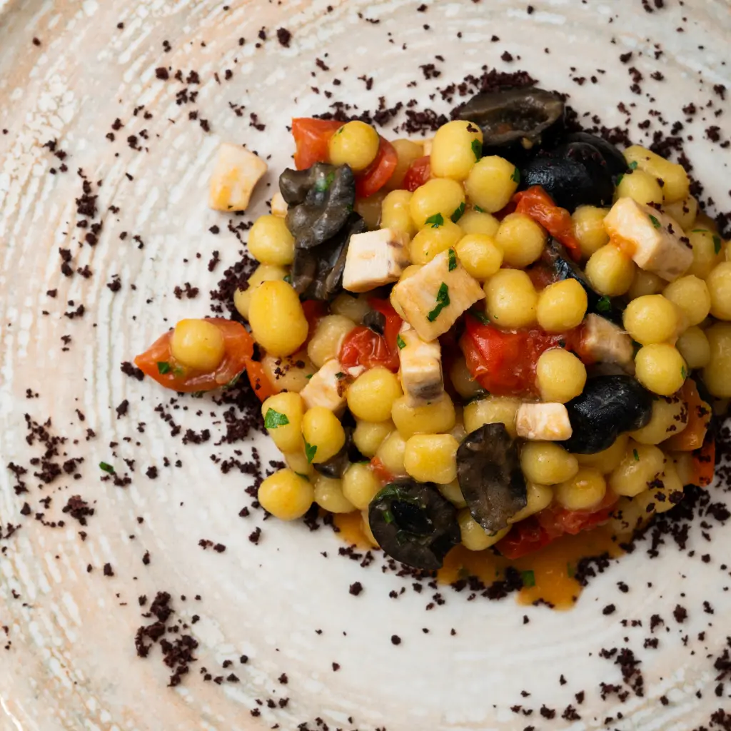 Chicche Di Patate, Spada, Pomodorini, Olive E Capperi